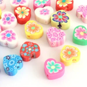 Perles coeurs à motifs multicolores Polymères